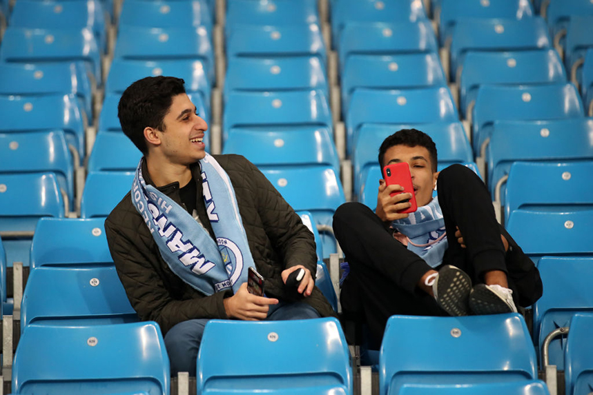 City fans enjoy a moment during their opening Champions League home fixture against Dynamo Zagreb. (Photo: Alex Pantling/Getty Images)