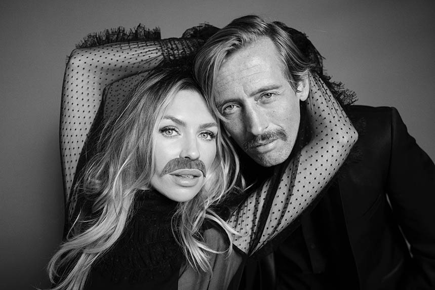 Abbey Clancy with husband Peter Crouch, in one of the celebrity portraits by Greg Williams for this year's Movember campaign