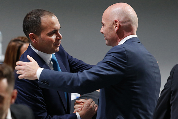 Prince Ali (left) congratulates new FIFA president Infantino (Credit: Michael Probst/AP/Press Association Images)