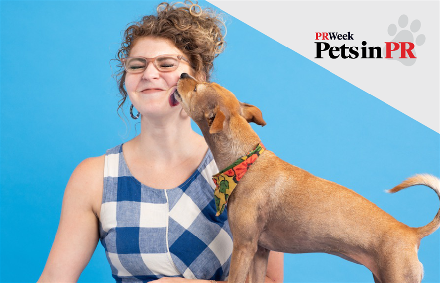 Dog licking woman's face