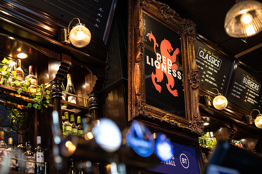 BT: pub decorated with women's sporting memorabilia