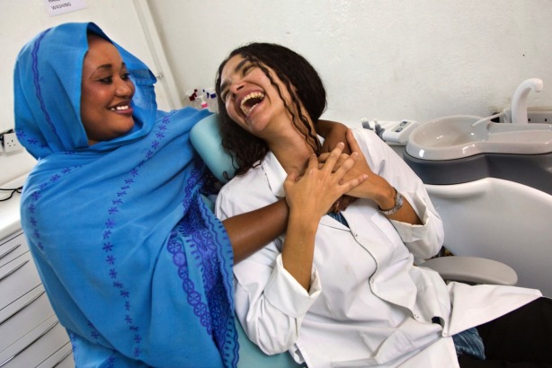 Colombian UN volunteer dentist Liliana Patricia Gutierrez Freyle and Darfuri staff Hawa Awadallah at Level 2 Hospital, El Fasher, Sudan