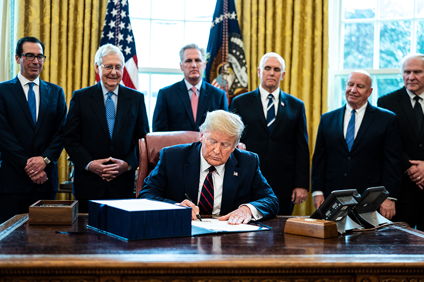 President Trump signs business relief into law last Friday. (Photo credit: Getty Images)