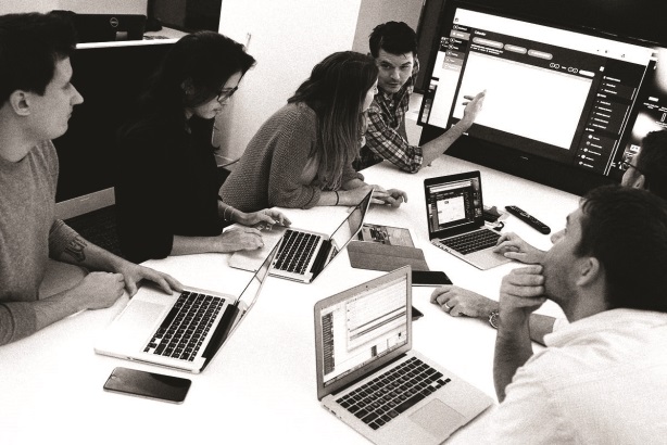 Weber Shandwick SVP Eric Weitner leads a strategy meeting for Mediaco Publish, the agency's content management system for brand publishers.