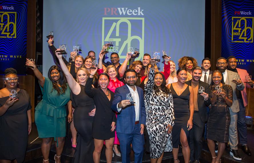 The 40 Under 40 class of 2021 honorees celebrate in Manhattan last night with their trophies. (Credit: Erica Berger)