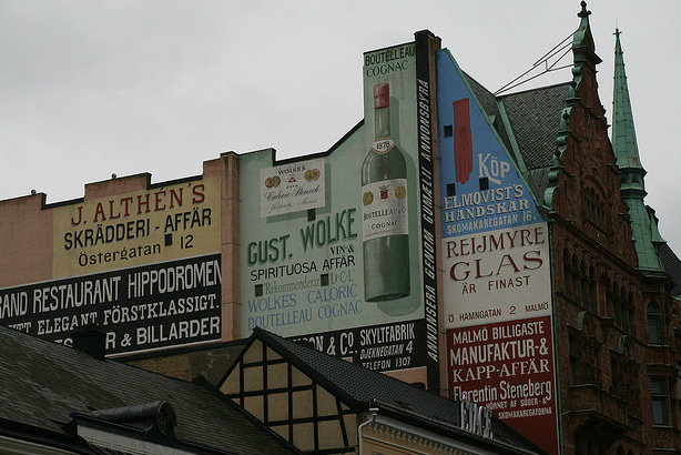 Adverts on a wall in Malmö, Sweden (Credit: Wrote via Flickr)