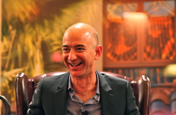 (Image via Wikimedia Commons, by Steve Jurvetson - Flickr: Bezos’ Iconic Laugh, CC BY 2.0, https://commons.wikimedia.org/w/index.php?curid=21166413)