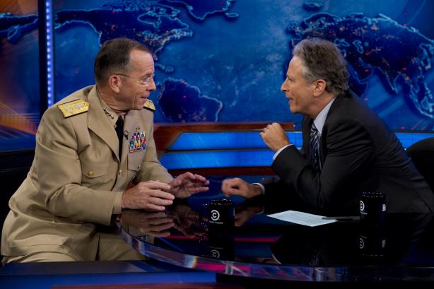 Jon Stewart with US Navy Admiral Mike Mullen (Image via the chairman of the Joint Chiefs Flickr page) 