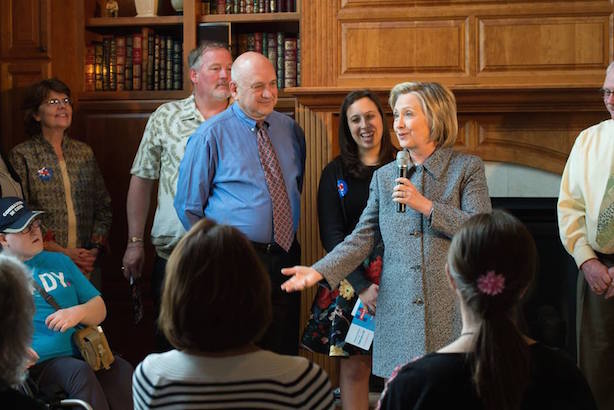 Clinton chats with supporters in Iowa. (Image via Clinton's Facebook page).