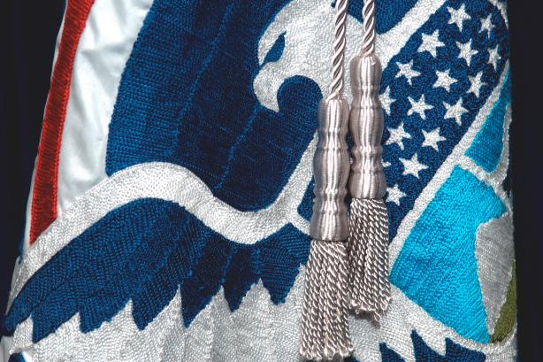 A closeup of the flag of the Department of Homeland Security (via Wikipedia Commons).