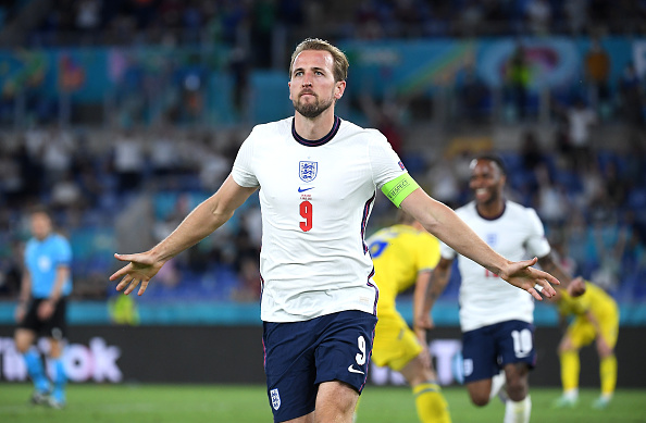 England striker Harry Kane celebrates after scoring the team's third goal in the Euro 2020 quarter-final match against Ukraine on Saturday (photo by Ettore Ferrari - Pool/Getty Images)