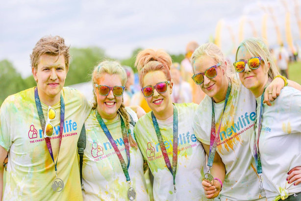 Royal Bank of Scotland staff raising money for Newlife the Charity for Disabled Children at the Colour Run, Uttoxeter, in 2018