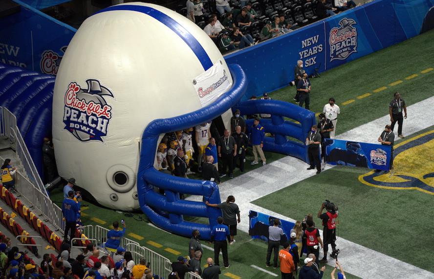 Football team prepares to take the field at the Chick-fil-A Peach Bowl