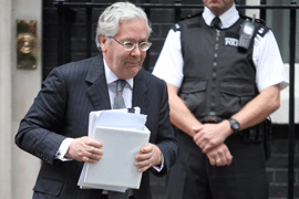 Rush: Governor Mervyn King arrives at Number 10 for crisis talks