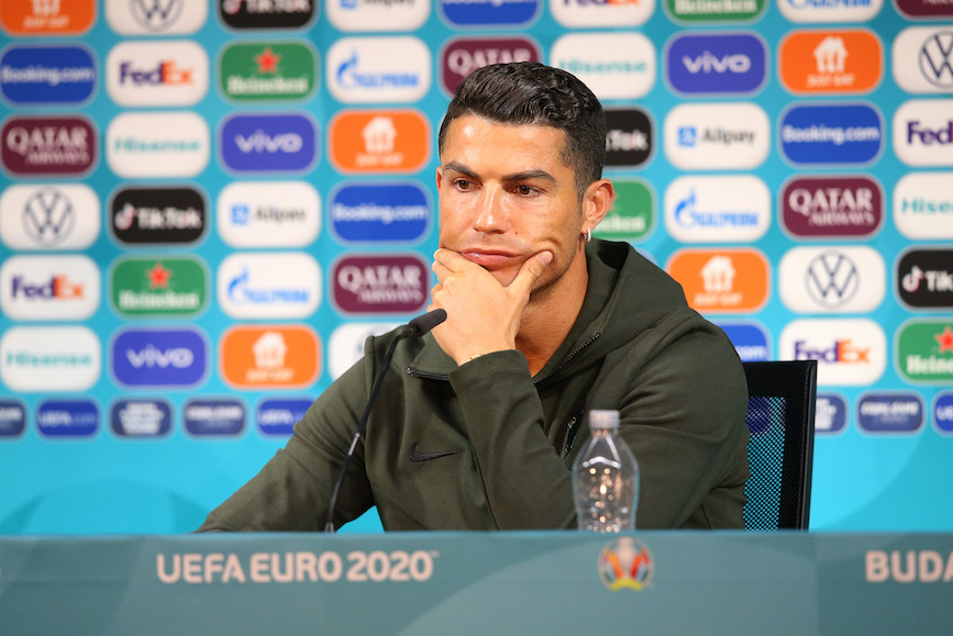 Soda-less Cristiano Ronaldo talks with the media at Euro 2020. (Photo credit: Getty Images). 
