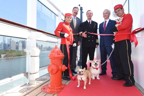Instagram dogs and Cunard execs at the ribbon-cutting ceremony.