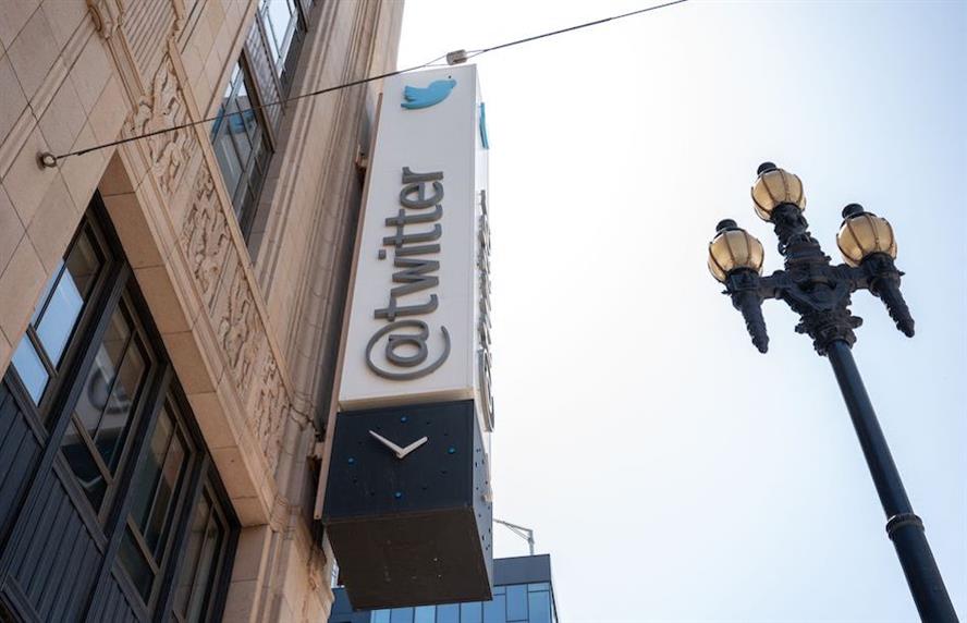 Twitter sign on office building facade