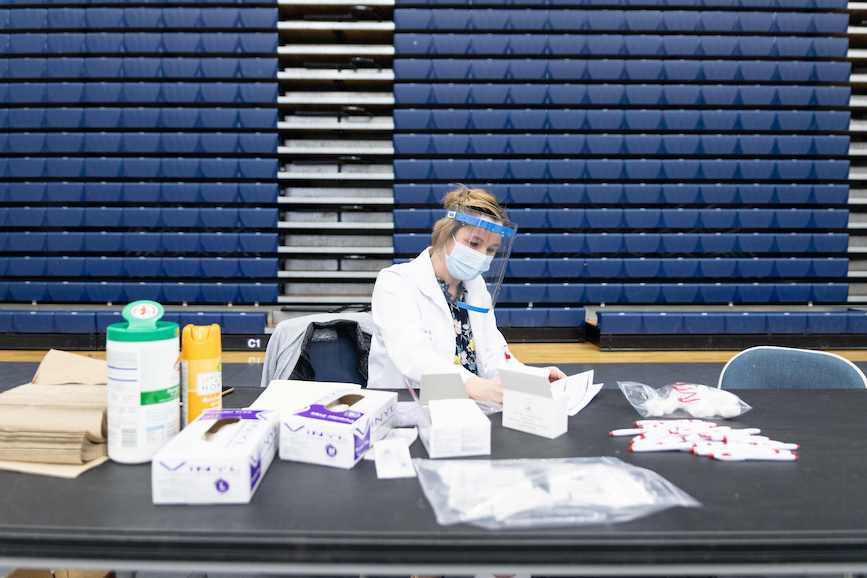 Walgreens staff prepare COVID-19 vaccines in Dayton, Ohio last month. (Photo credit: Getty Images).