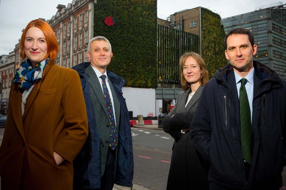 Clean and Green team members in front of hotel green wall put up as part of project (from left to right): Sam Davenport, Natural England; Adam Wallace, Natural England; Susanna Wilks, Cross River Partnership; David Beaumont, Victoria BID