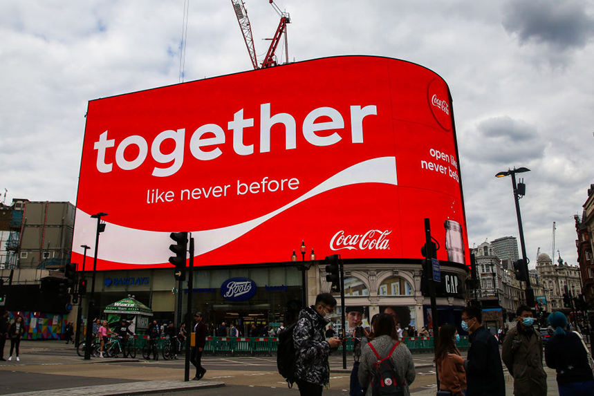 A recent Coca-Cola ad at London's Piccadilly Lights (Photo: Getty Images)