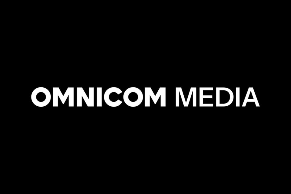 Omnicom Media white text on black background.
