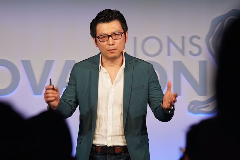 Chris Tung, chief marketing officer of Alibaba Group, speaks at Cannes Lions