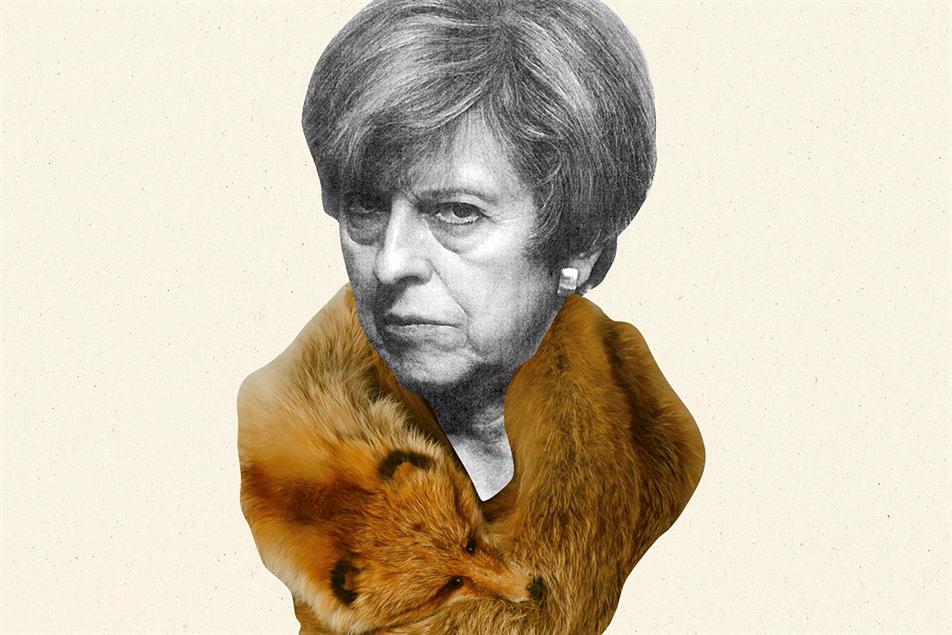 i newspaper depicted Theresa May with a fox fur stole
