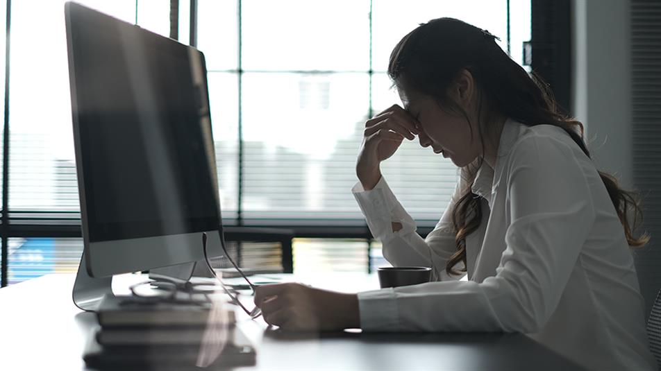 What causes unhappiness in the workplace?