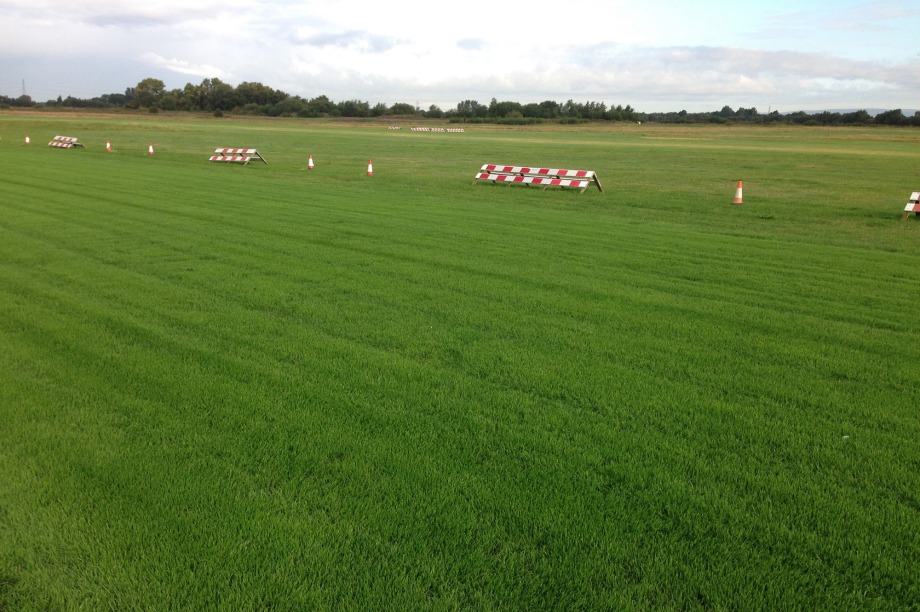 Grass runways provide unique groundskeeping challenge at Manchester